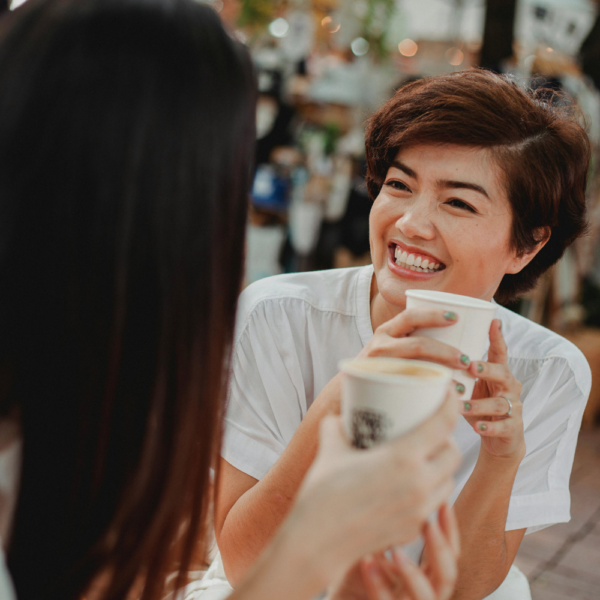 Happy woman smiling and feeling confident Habits to improve your self-confidence as introvert